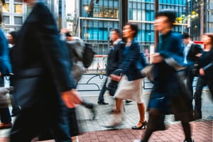 People walking down a busy street.